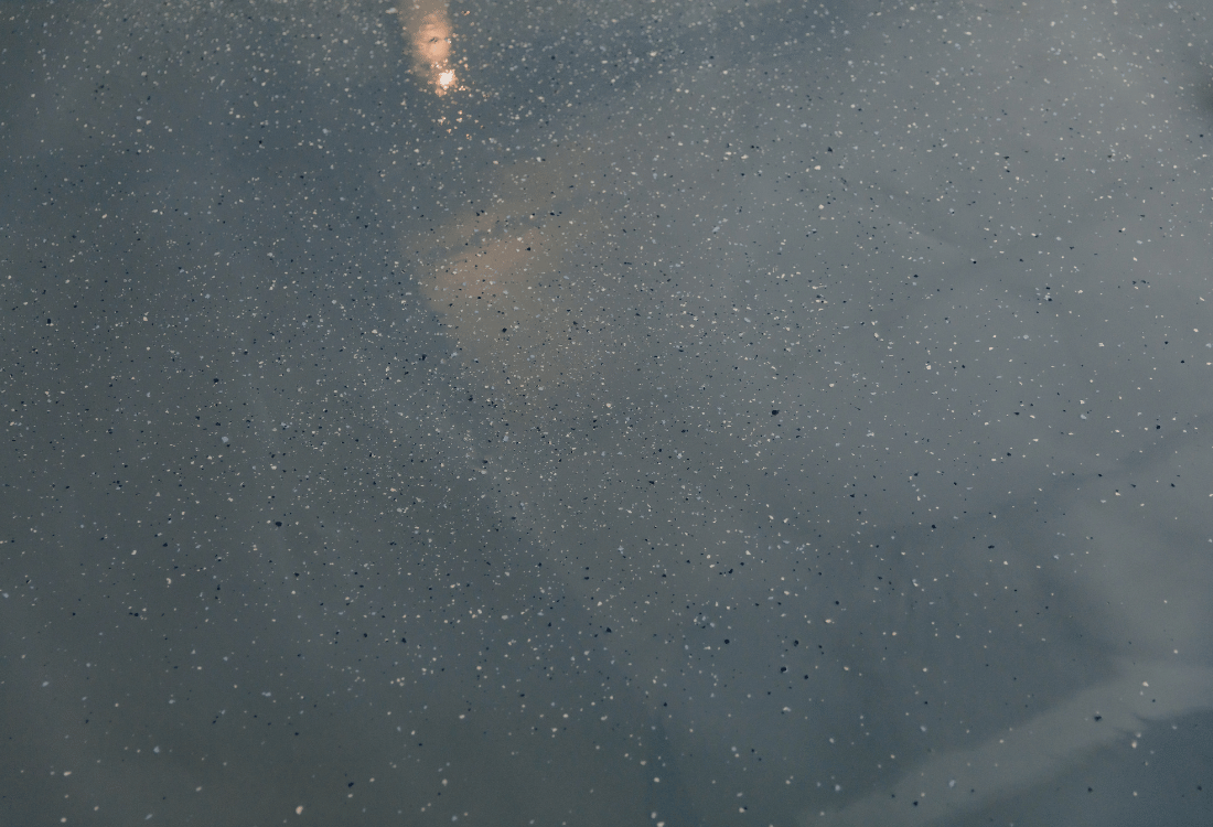 A decorative resin floor with decorative chips in the entrance of a warehouse. 