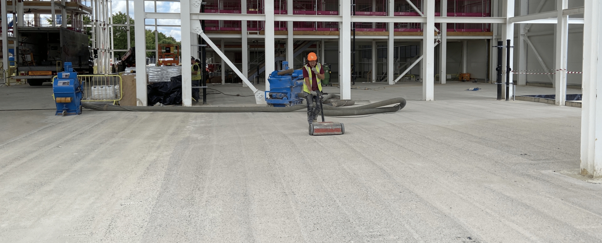 A construction worker on a resin floor